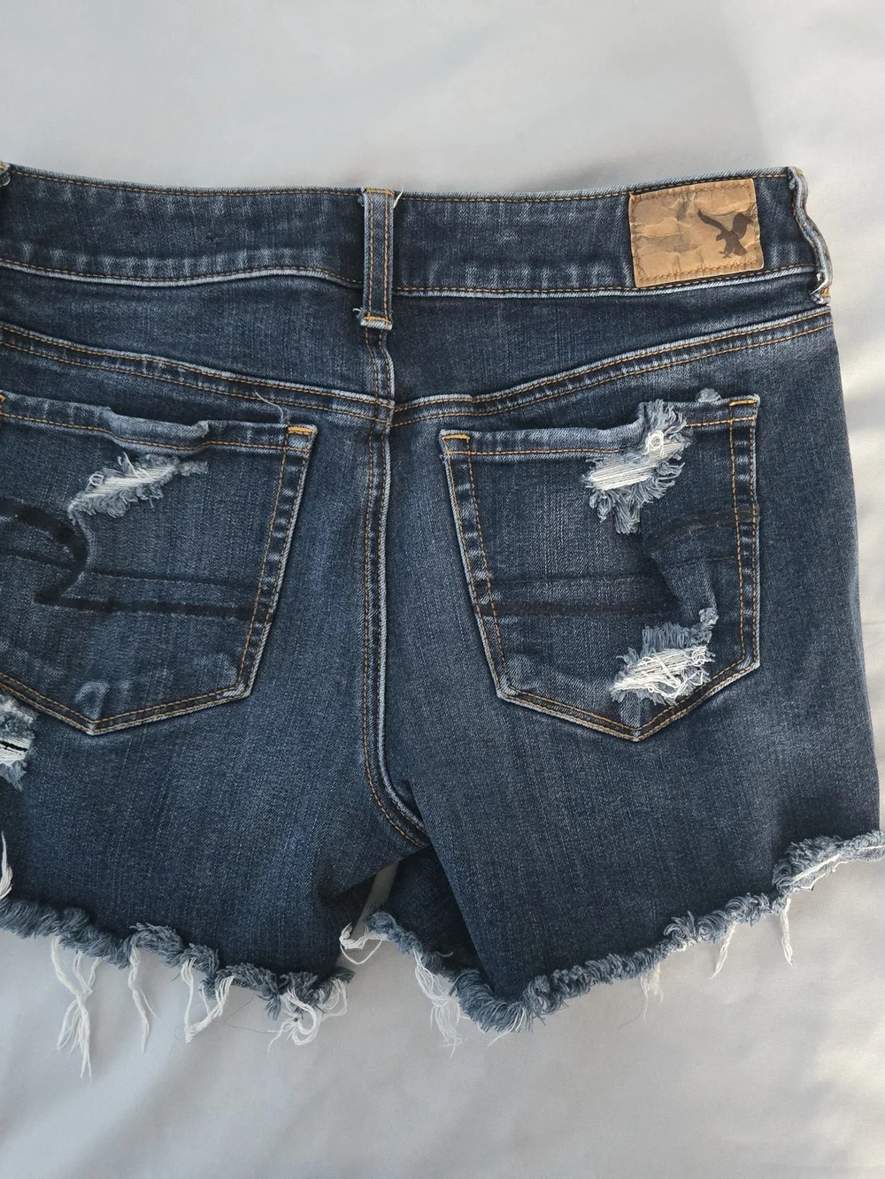 American Eagle Outfitters Dark Blue Distressed Denim Shorts – Size 4